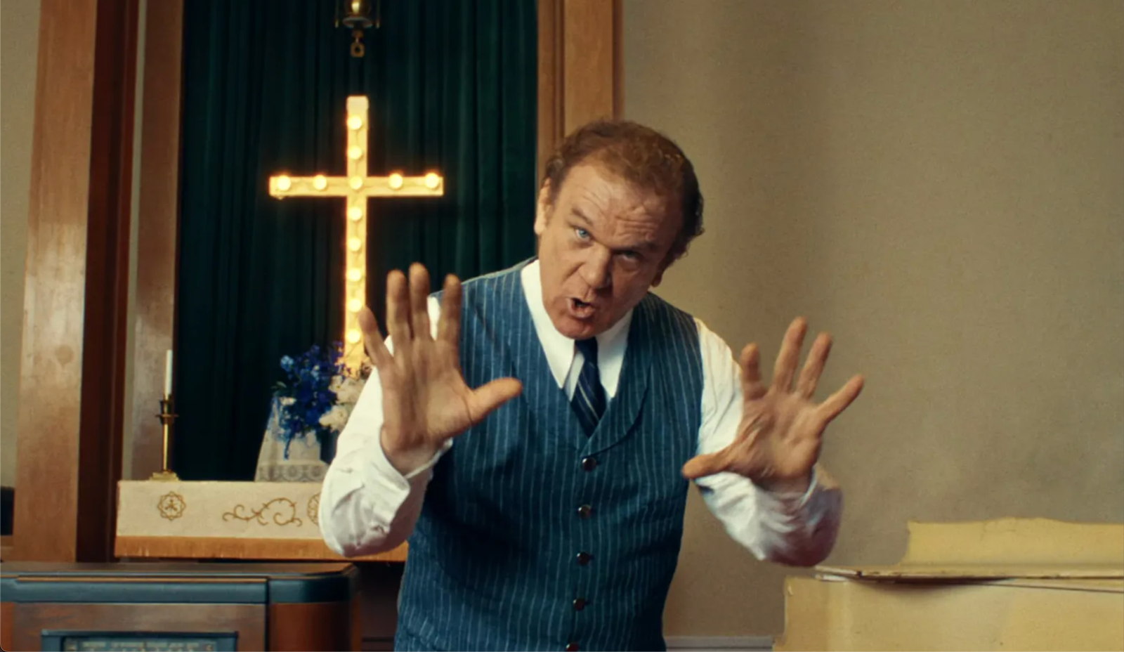 John C. Reilly Channels Divine Madness in Jack White’s “Archbishop Harold Holmes” Music Video